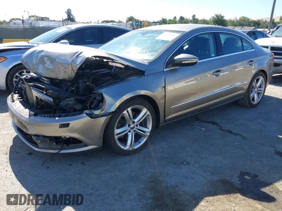 ✅ 2013 Volkswagen CC R-Line • VIN: WVWBP7AN5DE516953 • Lot: 42920630. Listed on IAAI with 107,428 mi. Free auction sales archive from the USA and detailed vehicle history report at DreamBid. Image 2.