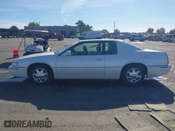 ✅ 1998 Cadillac Eldorado • VIN: 1G6EL12Y6WU615582 • Lot: 43654319. Wystawiony na IAAI z przebiegiem 170 408 mil. Bezpłatny archiwum sprzedaży aukcyjnych z USA i szczegółowy raport historii pojazdu na DreamBid. Zdjęcie 14.