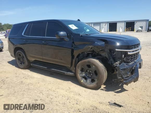 2023 Chevrolet Tahoe Commercial z VIN 1GNSKLED8PR336475, wystawiony jako Copart lot #71785115 z przebiegiem 31 865 mil mil oraz Szkoda całkowita • Salvage title. Historia ofert i sprzedaży dostępna na DreamBid. Obrazek 4.