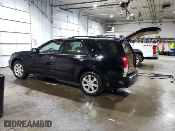 ✅ 2006 Cadillac SRX • VIN: 1GYEE637760122828 • Lot: 55697554. Listed on Copart with 152,275 mi. Free auction sales archive from the USA and detailed vehicle history report at DreamBid. Image 2.