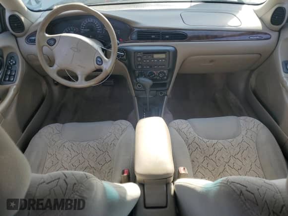 2003 Chevrolet Malibu LS z VIN 1G1NE52J03M675783, wystawiony jako Copart lot #83032764 z przebiegiem 185 343 mil mil oraz Nie do naprawy • Non repairable. Historia ofert i sprzedaży dostępna na DreamBid. Obrazek 8.