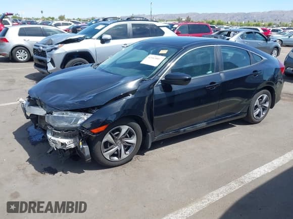 ✅ 2020 Honda Civic LX • VIN: 19XFC2F63LE210936 • Lot: 42163809. Listed on IAAI with 89,955 mi. Free auction sales archive from the USA and detailed vehicle history report at DreamBid. Image 2.