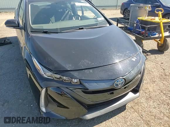 2021 Toyota Prius LE с VIN JTDKAMFP9M3170900, выставлен на аукционе Copart как лот 84271525 с пробегом 24 578 миль миль и Списание • Salvage title. История ставок и продаж доступна на DreamBid. Изображение 14.