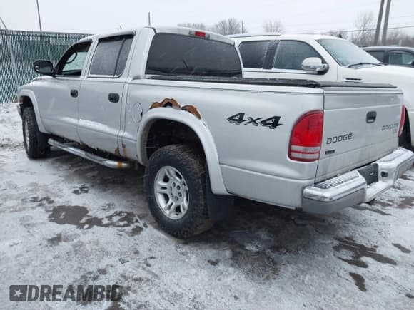 ✅ 2004 Dodge Dakota SLT • VIN: 1D7HG48N34S665027 • Lot: 41395509. Wystawiony na IAAI z przebiegiem 128 064 mil. Bezpłatny archiwum sprzedaży aukcyjnych z USA i szczegółowy raport historii pojazdu na DreamBid. Zdjęcie 3.