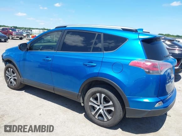 ✅ 2017 Toyota RAV4 LE • VIN: JTMZFREV9HJ702581 • Lot: 42338876. Listed on IAAI with 180,291 mi. Free auction sales archive from the USA and detailed vehicle history report at DreamBid. Image 3.
