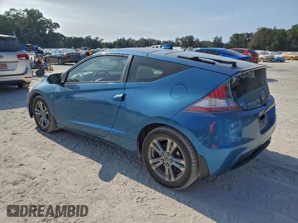 ✅ 2013 Honda CR-Z EX • VIN: JHMZF1D60DS002219 • Lot: 95681475. Listed on Copart with 122,673 mi. Free auction sales archive from the USA and detailed vehicle history report at DreamBid. Image 2.