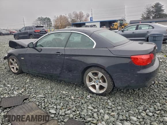 ✅ 2011 BMW 3 Series 335i • VIN: WBADX7C53BE260828 • Lot: 93533705. Listed on Copart with 124,969 mi. Free auction sales archive from the USA and detailed vehicle history report at DreamBid. Image 2.
