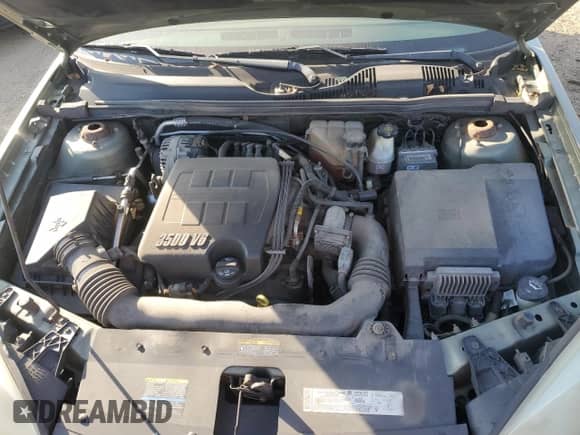 2005 Chevrolet Malibu LS z VIN 1G1ZT52855F245839, wystawiony jako Copart lot #75214744 z przebiegiem 223 137 mil mil oraz Szkoda całkowita • Salvage title. Historia ofert i sprzedaży dostępna na DreamBid. Obrazek 11.