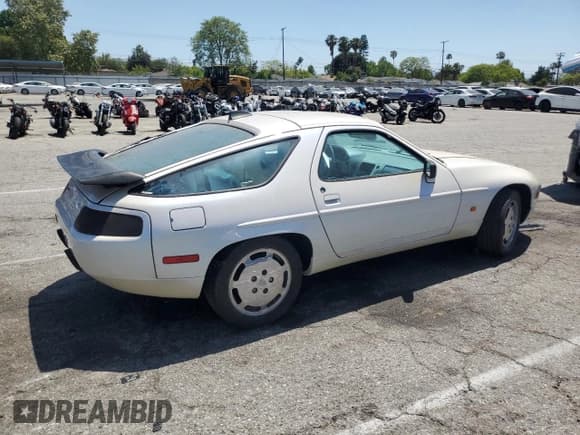 ✅ 1988 Porsche 928 • VIN: WP0JB0927JS860826 • Lot: 59000165. Listed on Copart with 56,317 mi. Free auction sales archive from the USA and detailed vehicle history report at DreamBid. Image 3.