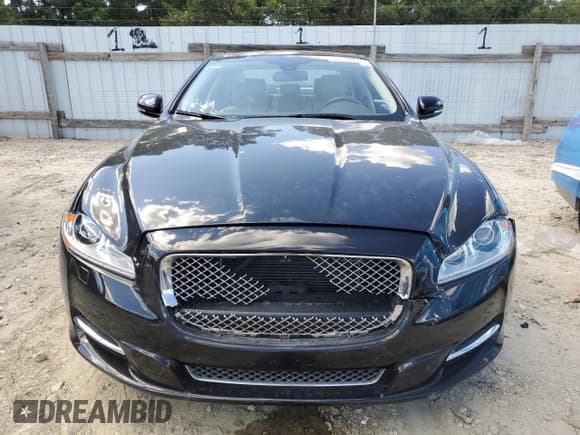 ✅ 2015 Jaguar XJ • VIN: SAJWJ1CD8F8V80055 • Lot: 69726395. Listed on Copart with 66,455 mi. Free auction sales archive from the USA and detailed vehicle history report at DreamBid. Image 5.