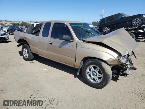 ✅ 1996 Toyota Tacoma • VIN: 4TAVN52N7TZ093995 • Lot: 76380944. Listed on Copart with 242,094 mi. Free auction sales archive from the USA and detailed vehicle history report at DreamBid. Image 4.