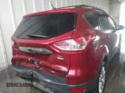 ✅ 2013 Ford Escape SEL • VIN: 1FMCU9HX2DUB79885 • Lot: 42341050. Listed on IAAI with 117,236 mi. Free auction sales archive from the USA and detailed vehicle history report at DreamBid. Image 4.