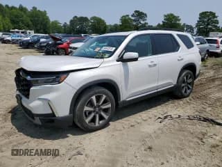 ✅ 2023 Honda Pilot Touring • VIN: 5FNYG1H75PB018012 • Lot: 58642615. Listed on Copart with 26,878 mi. Free auction sales archive from the USA and detailed vehicle history report at DreamBid. Image 1.