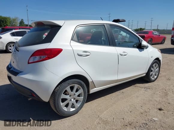 ✅ 2012 Mazda 2 Touring • VIN: JM1DE1LZ6C0135409 • Lot: 42873242. Listed on IAAI with 64,333 mi. Free auction sales archive from the USA and detailed vehicle history report at DreamBid. Image 4.