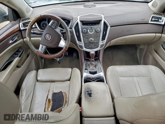 ✅ 2012 Cadillac SRX Performance Collection • VIN: 3GYFNBE37CS532590 • Lot: 94237585. Listed on Copart with 166,412 mi. Free auction sales archive from the USA and detailed vehicle history report at DreamBid. Image 8.