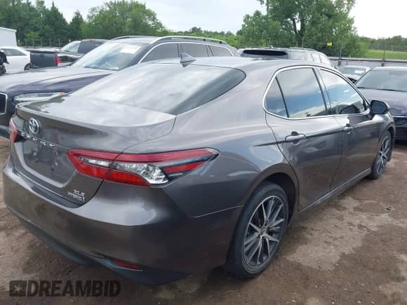 2022 Toyota Camry Hybrid XLE with VIN 4T1F31AK0NU589375, listed as a IAAI auction lot 42600441 with 28,781 mi miles and . Bid and sale history available at DreamBid. Image 4.