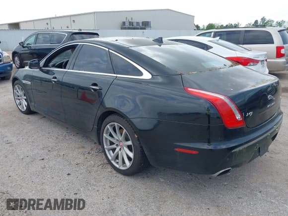 ✅ 2014 Jaguar XJ • VIN: SAJWA1CZ9E8V60522 • Лот: 41919728. Опубликован ранее на IAAI с пробегом 122 184 миль. Бесплатный доступ к архиву аукционных продаж из США и подробный отчёт об истории автомобиля на DreamBid. Изображение 3.