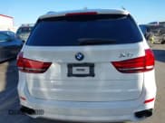✅ 2014 BMW X5 xDrive35i • VIN: 5UXKR0C53E0H21184 • Lot: 43520480. Listed on IAAI with 75,808 mi. Free auction sales archive from the USA and detailed vehicle history report at DreamBid. Image 15.