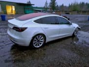 ✅ 2018 Tesla Model 3 Long Range Battery • VIN: 5YJ3E1EA0JF003831 • Лот: 94268515. Опубликован ранее на Copart с пробегом 166 487 миль. Бесплатный доступ к архиву аукционных продаж из США и подробный отчёт об истории автомобиля на DreamBid. Изображение 3.