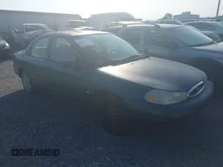 ✅ 1998 Ford Contour LX • VIN: 1FAFP6536WK231872 • Lot: 42409890. Listed on IAAI with 122,577 mi. Free auction sales archive from the USA and detailed vehicle history report at DreamBid. Image 1.