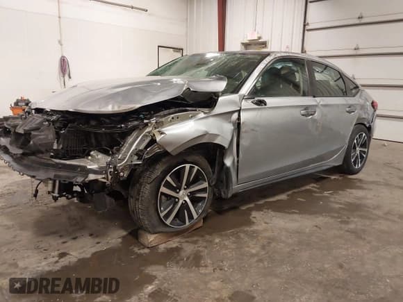✅ 2023 Honda Civic LX • VIN: 19XFL2H56PE013429 • Lot: 43223544. Listed on IAAI with 23,000 mi. Free auction sales archive from the USA and detailed vehicle history report at DreamBid. Image 2.