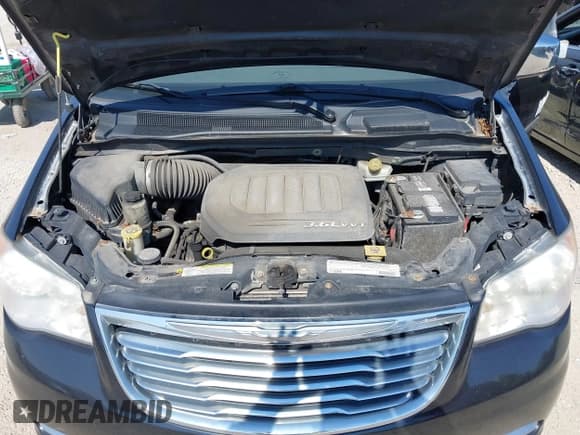 ✅ 2012 Chrysler Town & Country Touring L • VIN: 2C4RC1CG6CR412222 • Лот: 43249410. Опубликован ранее на IAAI с пробегом 199 374 миль. Бесплатный доступ к архиву аукционных продаж из США и подробный отчёт об истории автомобиля на DreamBid. Изображение 10.