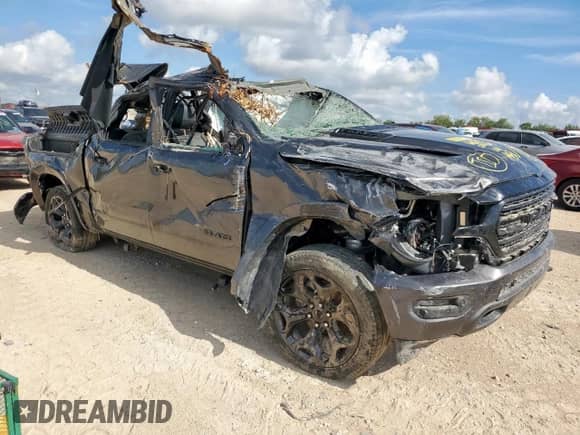 2024 Ram 1500 Limited with VIN 1C6SRFHT7RN213471, listed as a Copart auction lot 61980975 with Not provided miles and Non repairable. Bid and sale history available at DreamBid. Image 4.