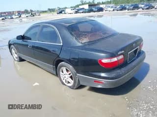 ✅ 2000 Mazda Millenia • VIN: JM1TA2210Y1614323 • Lot: 42699382. Wystawiony na IAAI z przebiegiem 232 959 mil. Bezpłatny archiwum sprzedaży aukcyjnych z USA i szczegółowy raport historii pojazdu na DreamBid. Zdjęcie 3.