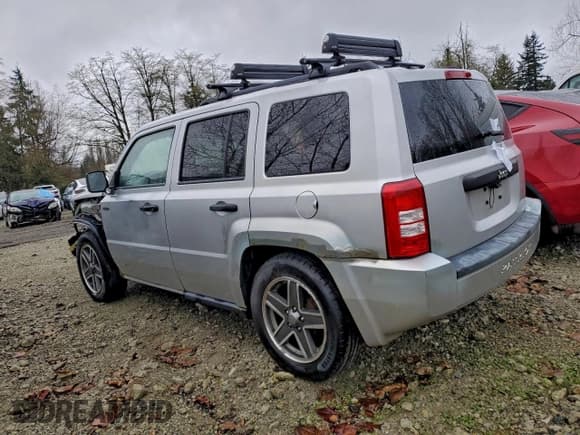 ✅ 2009 Jeep Patriot Sport • VIN: 1J4FT28B99D126389 • Lot: 92675745. Listed on Copart with 292,882 mi. Free auction sales archive from the USA and detailed vehicle history report at DreamBid. Image 2.