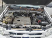 ✅ 2010 Ford Escape Hybrid • VIN: 1FMCU5K38AKC05671 • Lot: 91097215. Wystawiony na Copart z przebiegiem 182 029 mil. Bezpłatny archiwum sprzedaży aukcyjnych z USA i szczegółowy raport historii pojazdu na DreamBid. Zdjęcie 12.