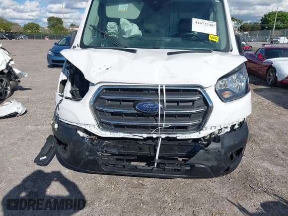 ✅ 2021 Ford Transit Cargo • VIN: 1FTBW3X8XMKA14051 • Lot: 41672248. Wystawiony na IAAI z przebiegiem 127 438 mil. Bezpłatny archiwum sprzedaży aukcyjnych z USA i szczegółowy raport historii pojazdu na DreamBid. Zdjęcie 6.