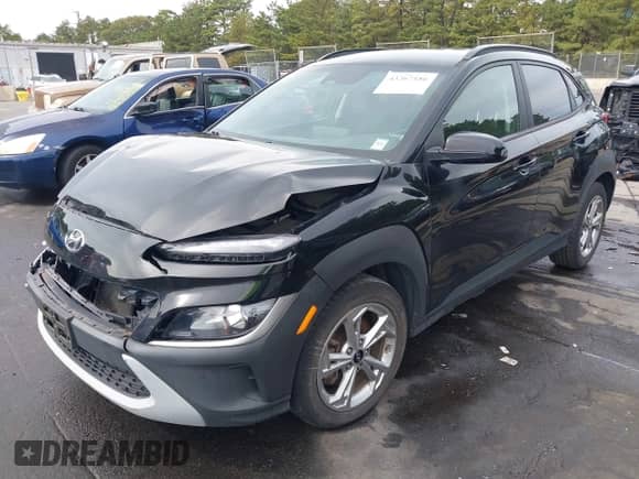 2023 Hyundai Kona SEL with VIN KM8K6CAB4PU932659, listed as a IAAI auction lot 43267186 with 82,586 mi miles and . Bid and sale history available at DreamBid. Image 2.