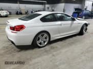 ✅ 2013 BMW 6 Series 650i xDrive • VIN: WBAYM1C58DDZ02671 • Лот: 59509955. Опубликован ранее на Copart с пробегом 76 630 миль. Бесплатный доступ к архиву аукционных продаж из США и подробный отчёт об истории автомобиля на DreamBid. Изображение 3.
