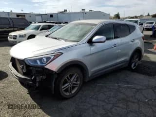 ✅ 2018 Hyundai Santa Fe 2.4L • VIN: 5XYZTDLB9JG549078 • Лот: 71850003. Опубликован ранее на Copart с пробегом Не указан. Бесплатный доступ к архиву аукционных продаж из США и подробный отчёт об истории автомобиля на DreamBid. Изображение 1.