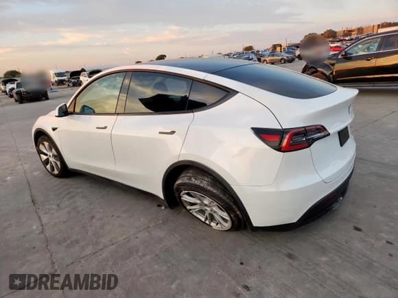 ✅ 2021 Tesla Model Y Long Range • VIN: 5YJYGDEEXMF069943 • Lot: 85187875. Listed on Copart with 48,448 mi. Free auction sales archive from the USA and detailed vehicle history report at DreamBid. Image 2.