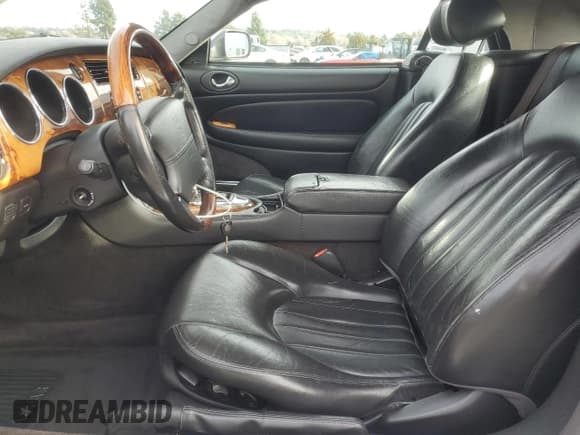 ✅ 2004 Jaguar XK • VIN: SAJDA42C442A37967 • Lot: 45768895. Listed on Copart with 124,130 mi. Free auction sales archive from the USA and detailed vehicle history report at DreamBid. Image 7.