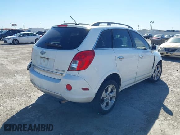 ✅ 2014 Chevrolet Captiva Sport LT • VIN: 3GNAL3EK2ES597862 • Lot: 43531898. Wystawiony na IAAI z przebiegiem 168 910 mil. Bezpłatny archiwum sprzedaży aukcyjnych z USA i szczegółowy raport historii pojazdu na DreamBid. Zdjęcie 4.