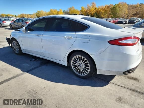✅ 2016 Ford Fusion Titanium • VIN: 3FA6P0K97GR135641 • Lot: 86659505. Wystawiony na Copart z przebiegiem 197 617 mil. Bezpłatny archiwum sprzedaży aukcyjnych z USA i szczegółowy raport historii pojazdu na DreamBid. Zdjęcie 2.