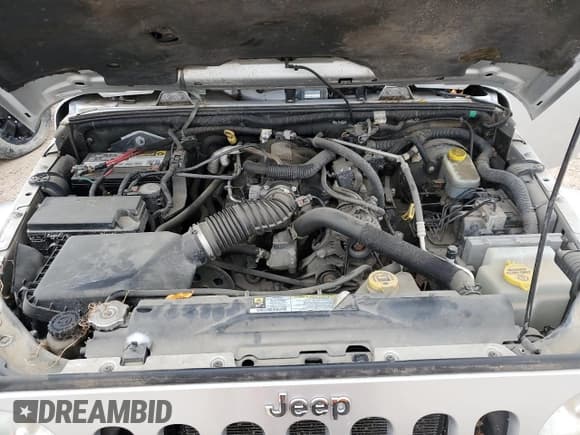 ✅ 2007 Jeep Wrangler Unlimited Sahara • VIN: 1J4GA59167L212909 • Lot: 82455775. Listed on Copart with 124,148 mi. Free auction sales archive from the USA and detailed vehicle history report at DreamBid. Image 11.