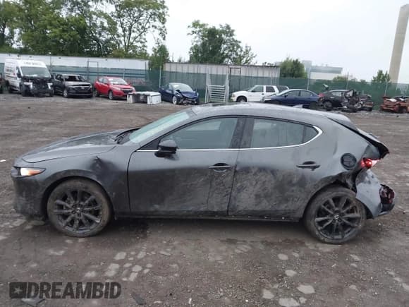 ✅ 2022 Mazda 3 2.5 Turbo • VIN: JM1BPBJY7N1519746 • Lot: 43036085. Listed on IAAI with 36,132 mi. Free auction sales archive from the USA and detailed vehicle history report at DreamBid. Image 14.