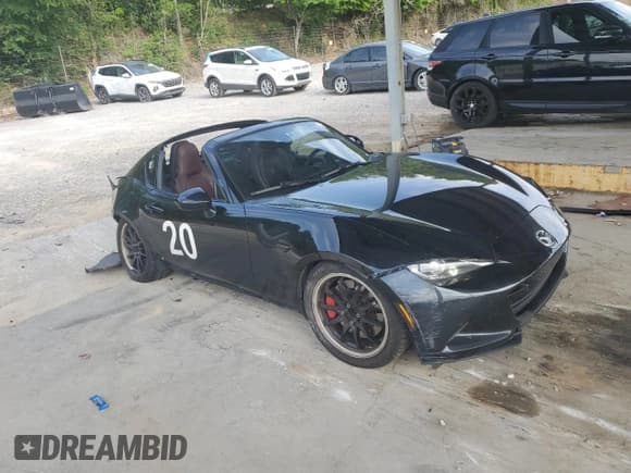 ✅ 2018 Mazda MX-5 Miata Grand Touring • VIN: JM1NDAM79J0203803 • Lot: 55037905. Listed on Copart with 136,440 mi. Free auction sales archive from the USA and detailed vehicle history report at DreamBid. Image 4.
