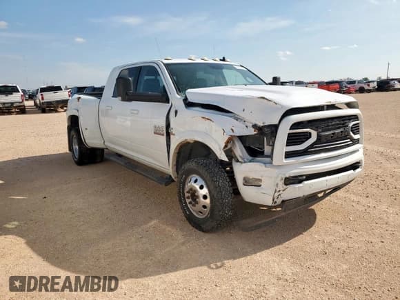 ✅ 2018 Ram 3500 Laramie • VIN: 3C63RRML4JG324083 • Lot: 63160795. Wystawiony na Copart z przebiegiem 169 022 mil. Bezpłatny archiwum sprzedaży aukcyjnych z USA i szczegółowy raport historii pojazdu na DreamBid. Zdjęcie 4.