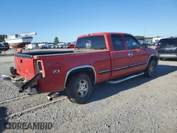 2001 Chevrolet Silverado 1500 LS с VIN 1GCEK19T61E219567, выставлен на аукционе Copart как лот 86839765 с пробегом Не указан миль и Списание • Salvage title. История ставок и продаж доступна на DreamBid. Изображение 3.