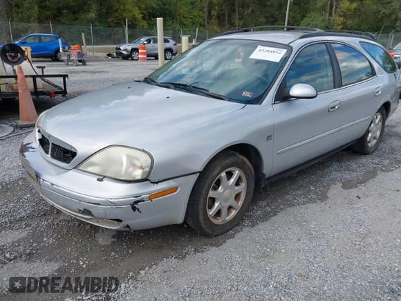 ✅ 2003 Mercury Sable LS Premium • VIN: 1MEHM59S73A613612 • Lot: 43284812. Listed on IAAI with 117,653 mi. Free auction sales archive from the USA and detailed vehicle history report at DreamBid. Image 2.