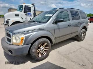 ✅ 2005 Dodge Durango SXT • VIN: 1D4HD38NX5F601092 • Лот: 63338515. Опубликован ранее на Copart с пробегом 301 984 миль. Бесплатный доступ к архиву аукционных продаж из США и подробный отчёт об истории автомобиля на DreamBid. Изображение 1.