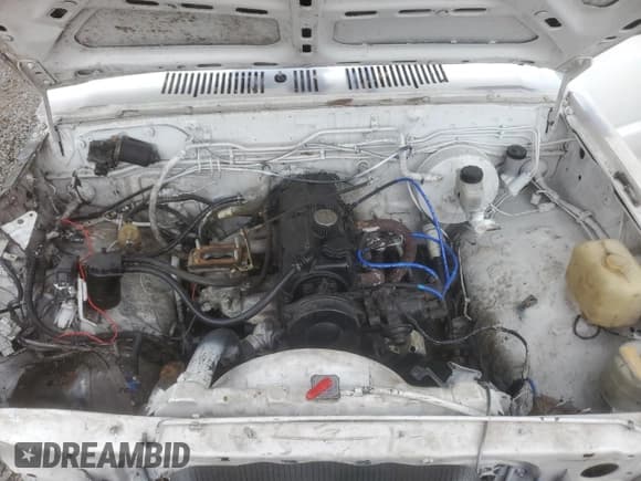 ✅ 1987 Mazda B-Series • VIN: JM2UF3116H0503600 • Lot: 70558694. Listed on Copart with 190,098 mi. Free auction sales archive from the USA and detailed vehicle history report at DreamBid. Image 11.