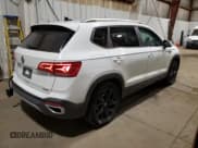 ✅ 2023 Volkswagen Taos SE • VIN: 3VVYX7B21PM313105 • Лот: 89555315. Опубликован ранее на Copart с пробегом 24 431 миль. Бесплатный доступ к архиву аукционных продаж из США и подробный отчёт об истории автомобиля на DreamBid. Изображение 3.