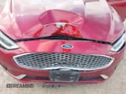 ✅ 2019 Ford Fusion Titanium • VIN: 3FA6P0K93KR132292 • Lot: 42803571. Listed on IAAI with 94,590 mi. Free auction sales archive from the USA and detailed vehicle history report at DreamBid. Image 6.