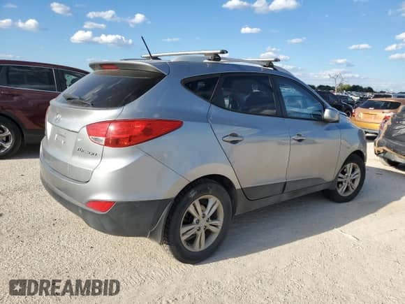 2011 Hyundai Tucson Limited z VIN KM8JU3ACXBU122083, wystawiony jako Copart lot #71179764 z przebiegiem 154 164 mil mil oraz Czysty tytuł • Clean title. Historia ofert i sprzedaży dostępna na DreamBid. Obrazek 3.