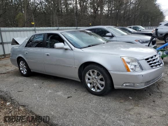 ✅ 2009 Cadillac DTS 1SA • VIN: 1G6KD57Y49U143001 • Lot: 47517295. Listed on Copart with 148,892 mi. Free auction sales archive from the USA and detailed vehicle history report at DreamBid. Image 4.